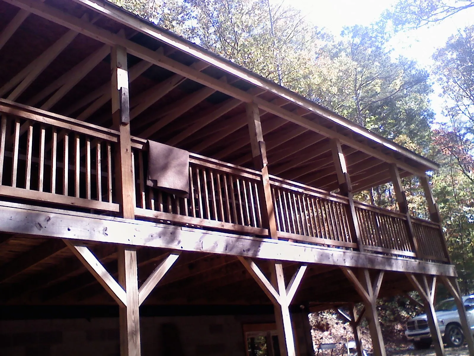 Timber framing under a new elevated porch and deck — Roof Leak Repair in Irvington by Roofing Brothers